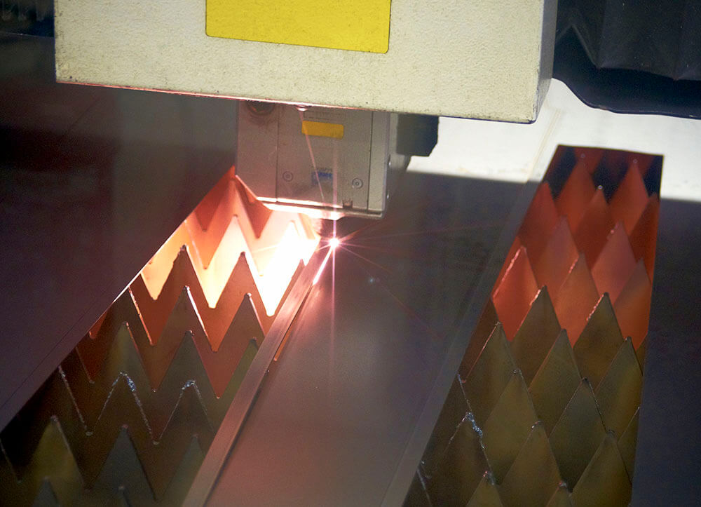 metal laser cutting - fibre laser cutter machine at work