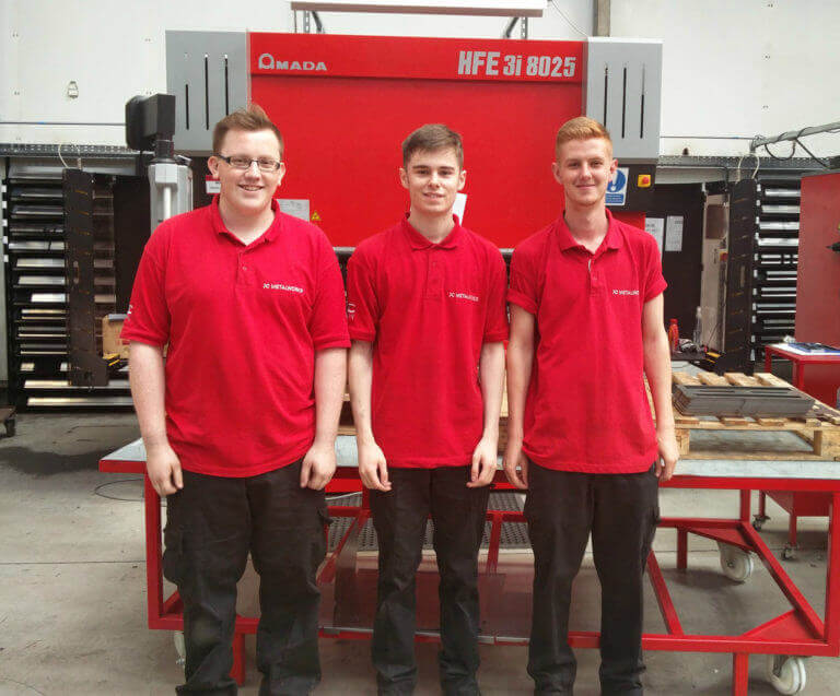 three metalworking apprentices promoting JC Metalworks engineering apprenticeships