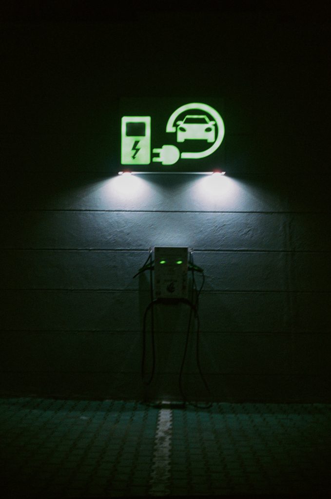 Lit-up sign for an EV charging point
